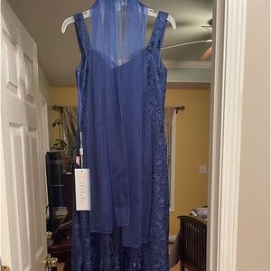 This is an exquisite dress with a small train in the back.  The XL is 12